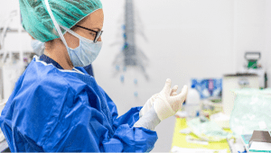 Public Health Science is Under Attack - photo of scientist in a lab