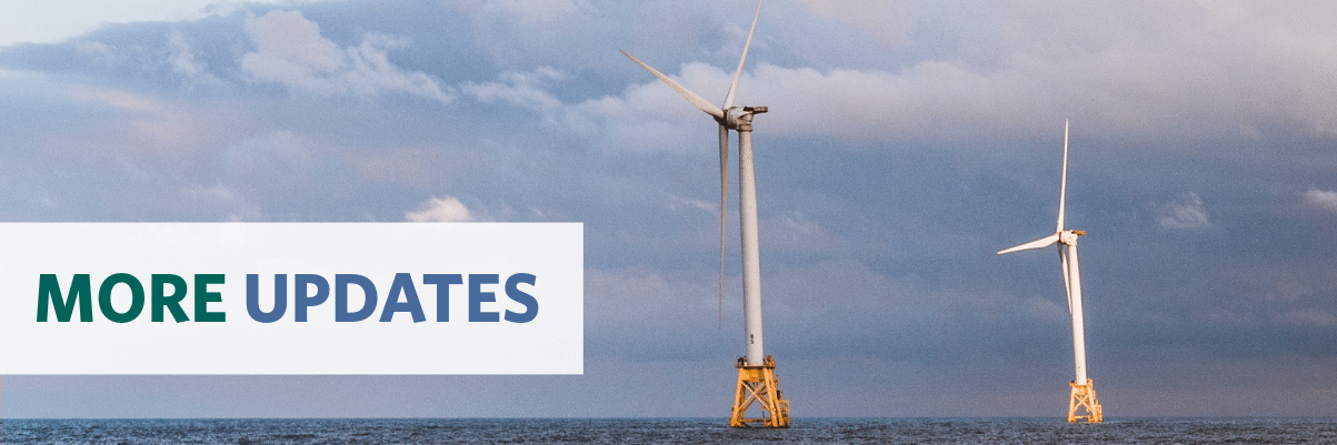 Photo of a clipboard with text "Inflation Reduction Act" on an American flag