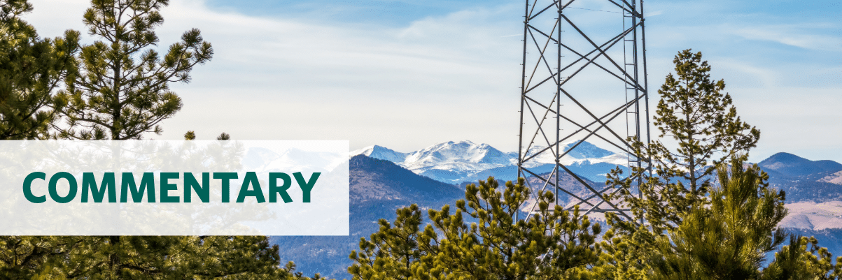 Photo of a clipboard with text "Inflation Reduction Act" on an American flag