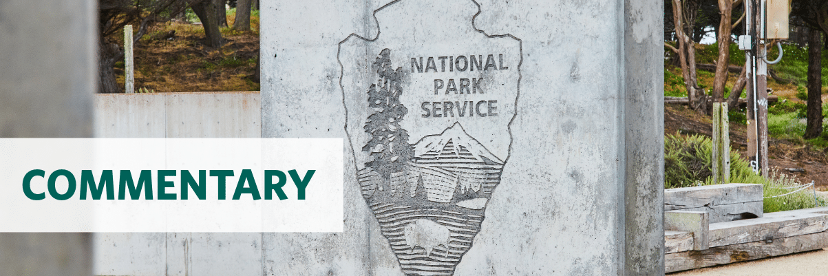 Photo of a clipboard with text "Inflation Reduction Act" on an American flag